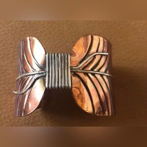 Sasspurilla copper and sterling cuff .. very unique 
Fits a smaller wrist